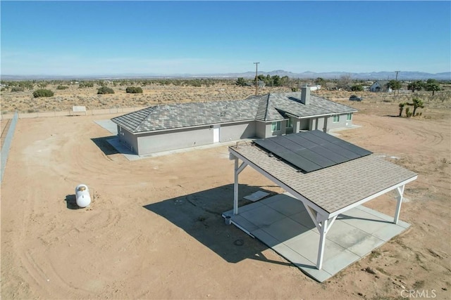 bird's eye view featuring view of desert, a rural view, and a mountain view