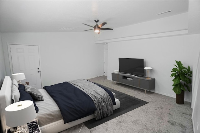 bedroom featuring carpet floors, baseboards, visible vents, and a ceiling fan