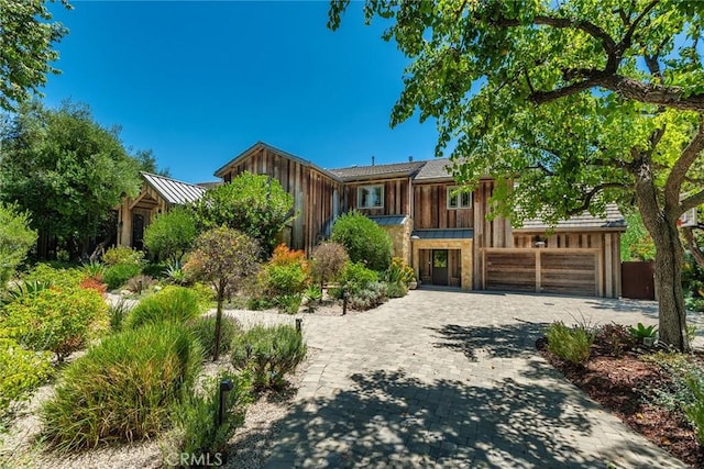 view of front of property featuring a garage