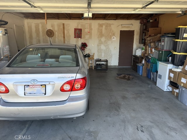 garage featuring gas water heater