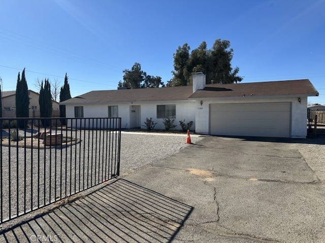 single story home with a garage