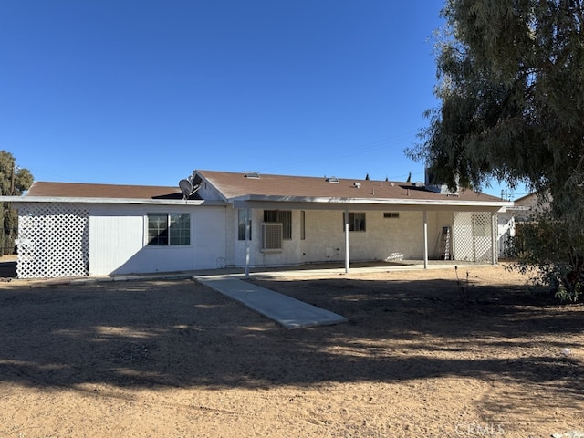 back of house featuring a patio