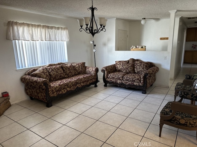 tiled living room featuring a textured ceiling