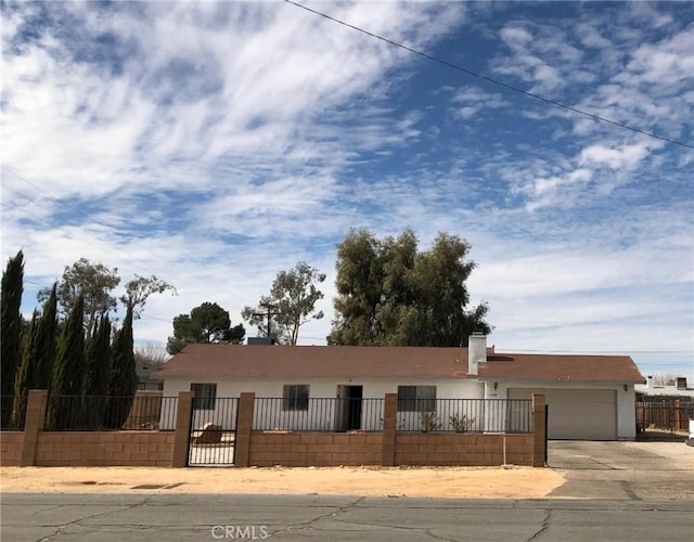 view of front of home featuring a garage