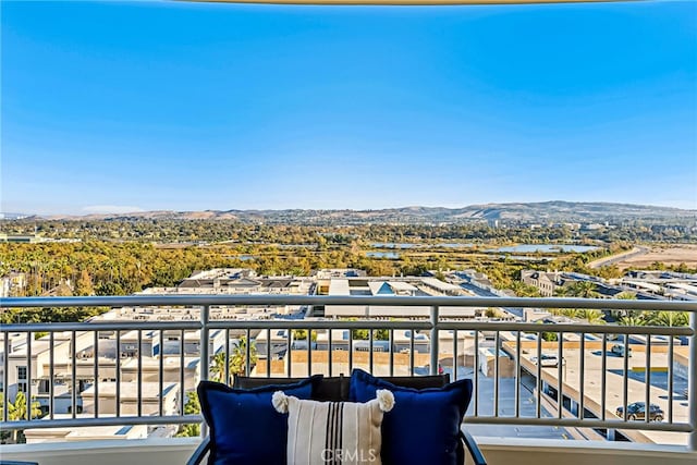 balcony featuring a mountain view