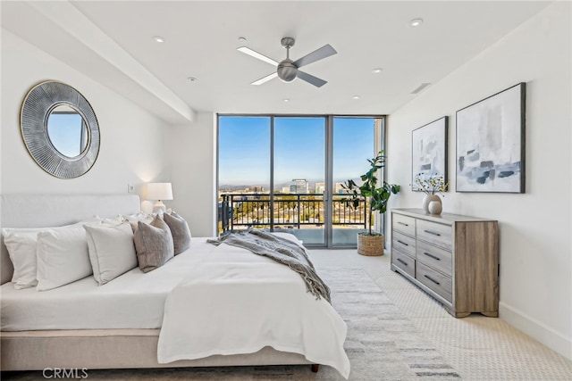 bedroom featuring recessed lighting, light carpet, a wall of windows, access to outside, and baseboards