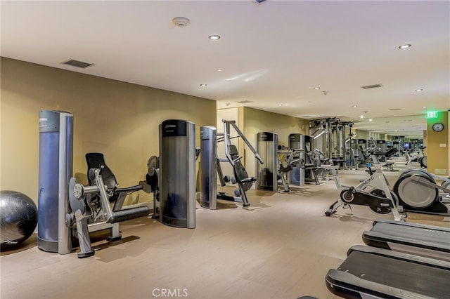 gym with visible vents and recessed lighting