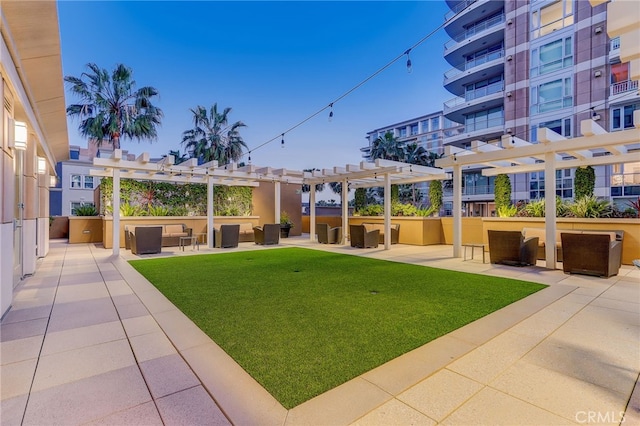 view of yard with a patio, an outdoor living space, and a pergola