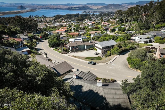 bird's eye view featuring a water and mountain view