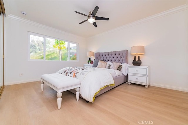 bedroom featuring crown molding, wood-type flooring, and ceiling fan