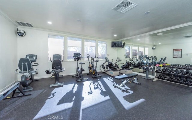 gym with ornamental molding