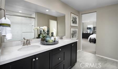 bathroom with vanity and an enclosed shower