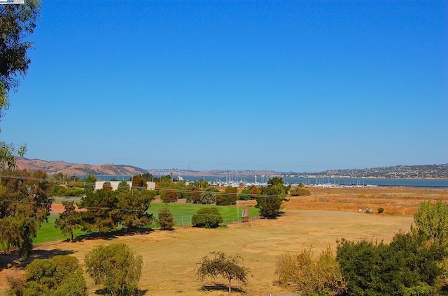 mountain view with a water view and a rural view