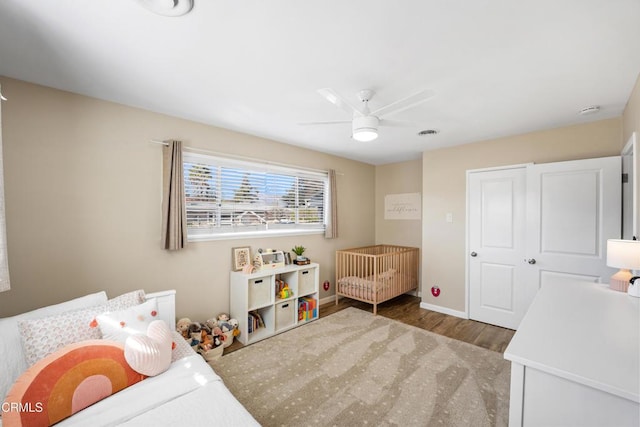 game room with wood-type flooring and ceiling fan