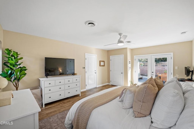 bedroom with ceiling fan, access to outside, french doors, and wood-type flooring