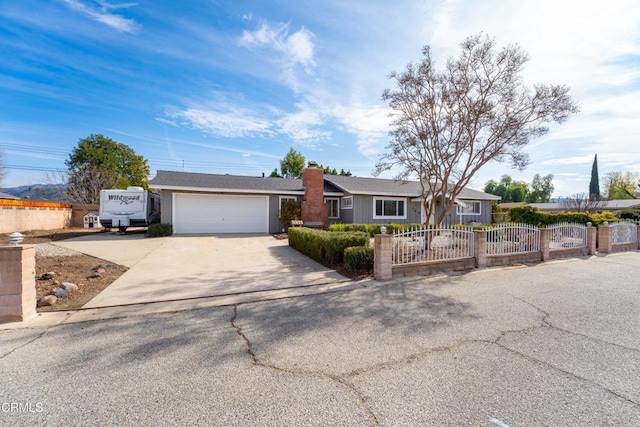 ranch-style home with a garage