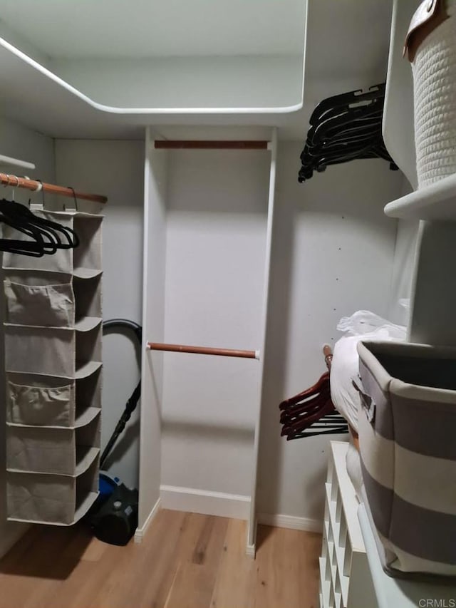 spacious closet with light wood-type flooring