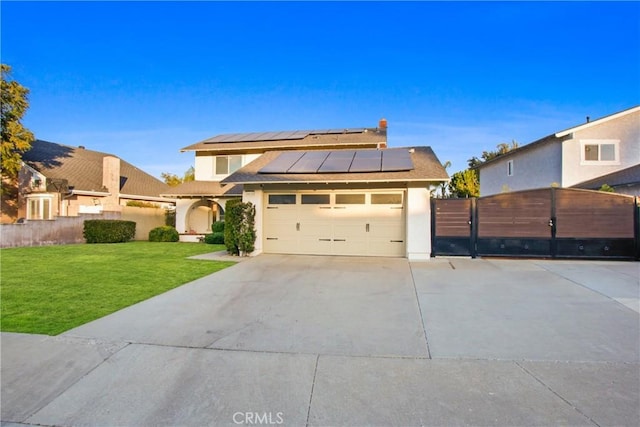 view of front facade with a front yard and solar panels