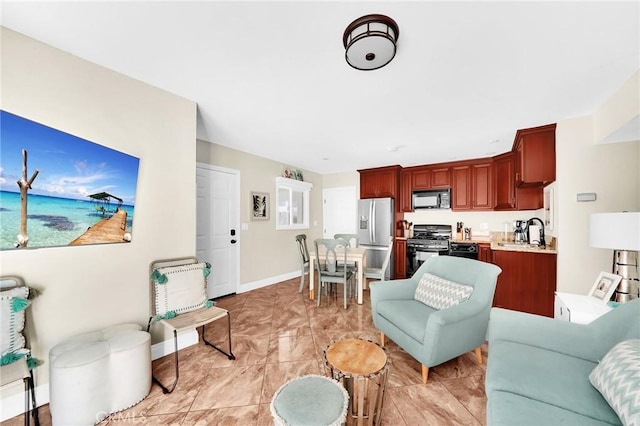 living room featuring sink