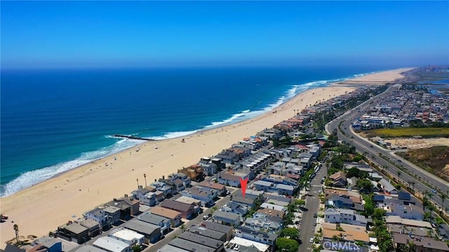 aerial view featuring a water view and a view of the beach