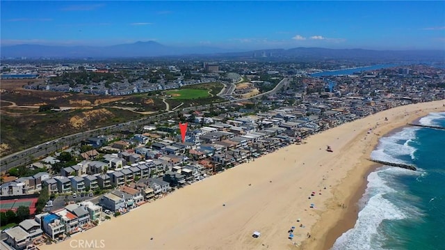 bird's eye view with a view of the beach and a water view