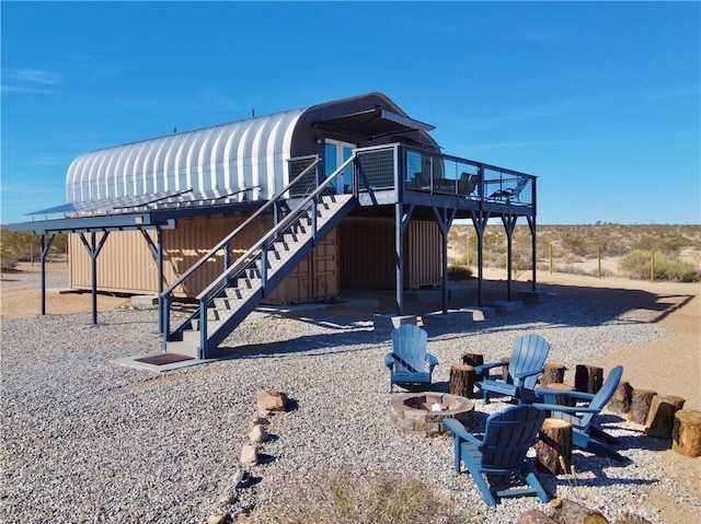 view of jungle gym featuring a fire pit