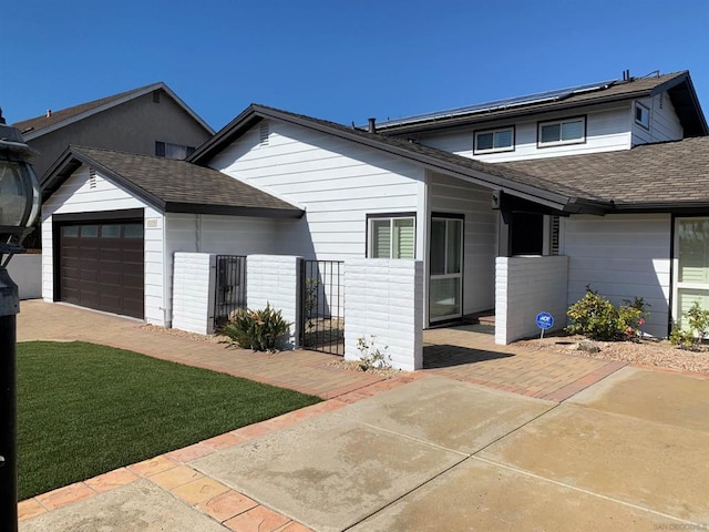 exterior space featuring a garage