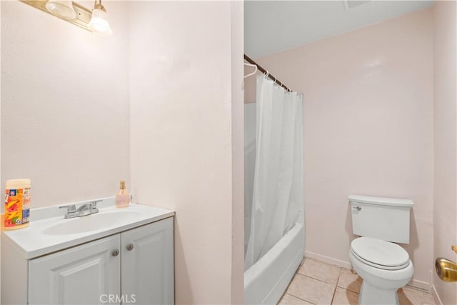 full bathroom with vanity, toilet, tile patterned flooring, and shower / bath combo