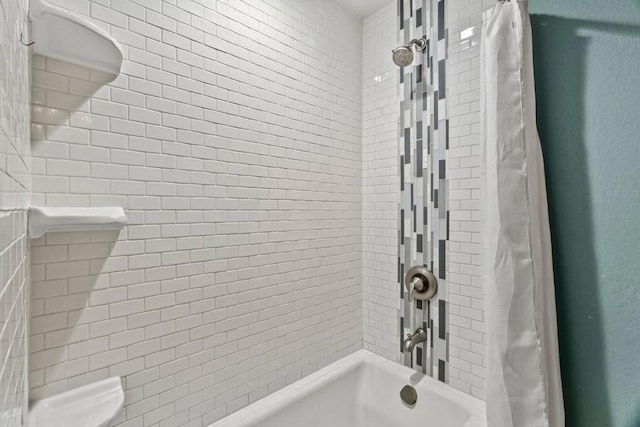 bathroom featuring shower / bath combo with shower curtain