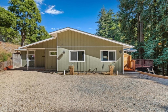 view of front of property featuring a wooden deck