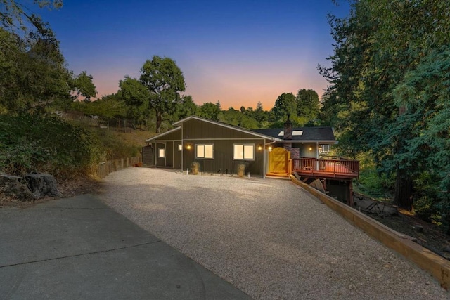 view of front of home featuring a wooden deck