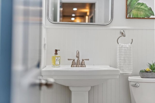 bathroom with sink and toilet