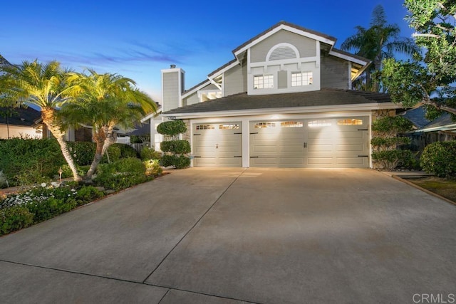 view of front of property featuring a garage