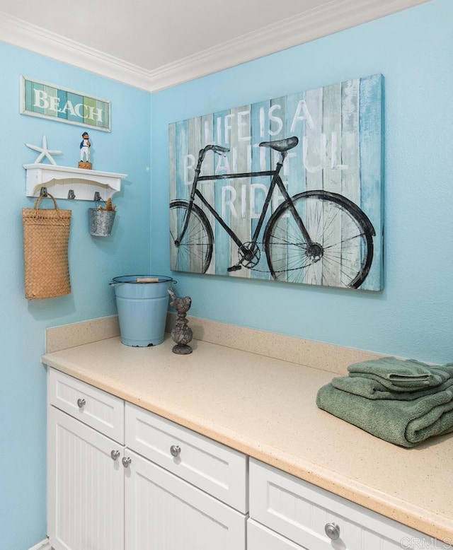 interior space with crown molding