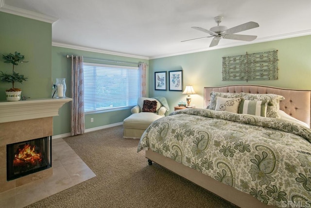 carpeted bedroom featuring ceiling fan, a multi sided fireplace, and ornamental molding