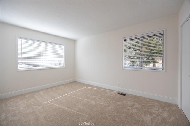 view of carpeted spare room