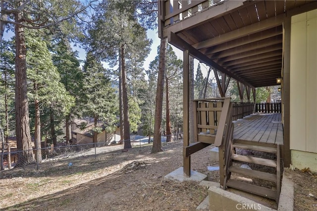 view of yard featuring a wooden deck