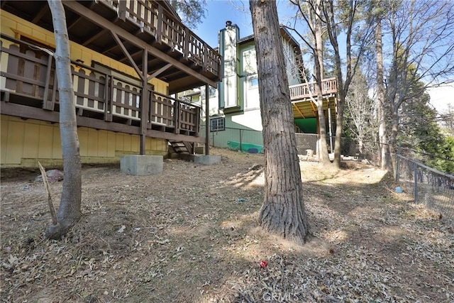 view of yard with a wooden deck