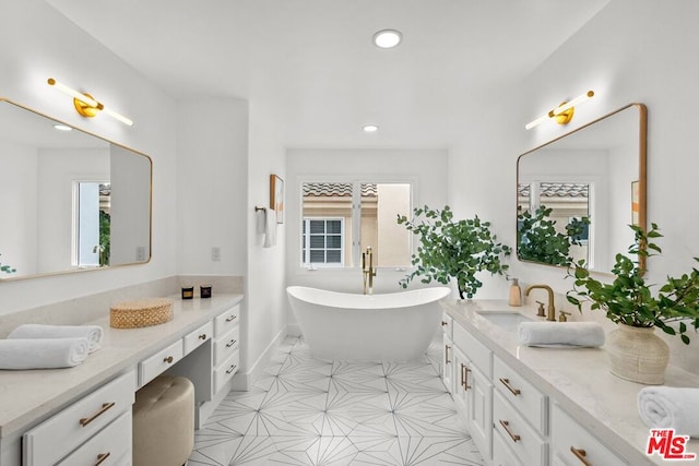 bathroom featuring vanity and a bathing tub