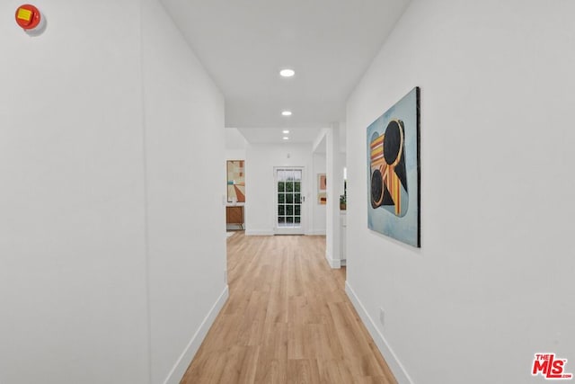 hallway featuring light wood-type flooring