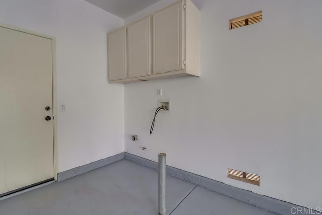 clothes washing area with cabinets, washer hookup, and hookup for a gas dryer