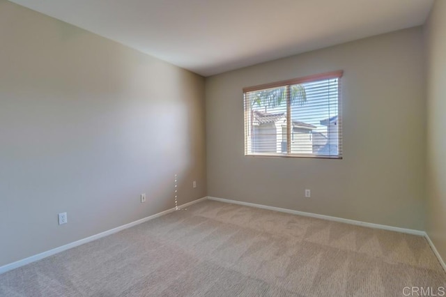 view of carpeted spare room