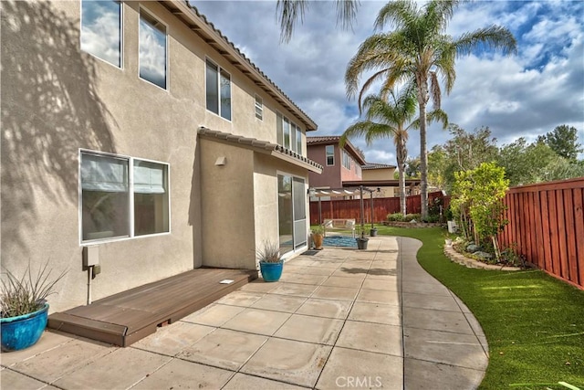 back of house featuring a patio