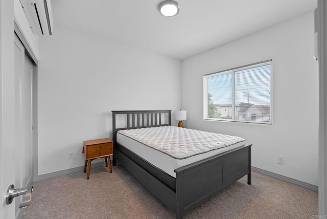 bedroom featuring a closet and carpet