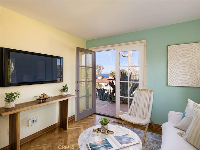 living room with parquet flooring