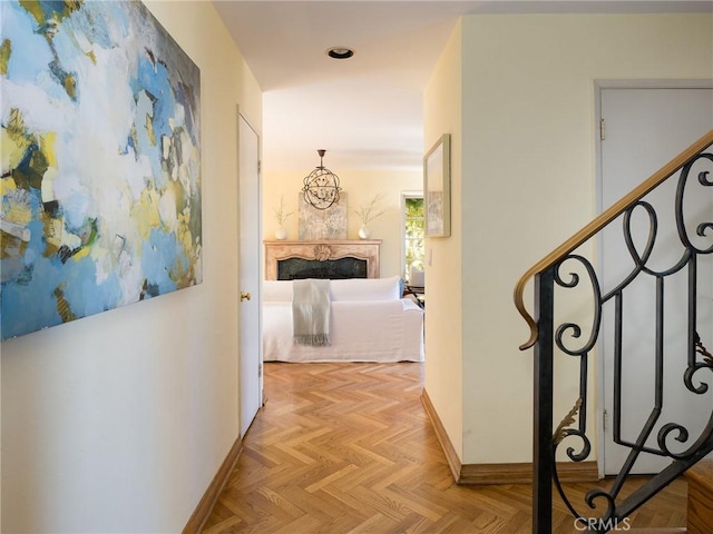 corridor featuring light parquet flooring