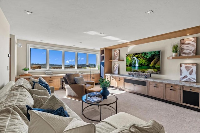 living room with light colored carpet