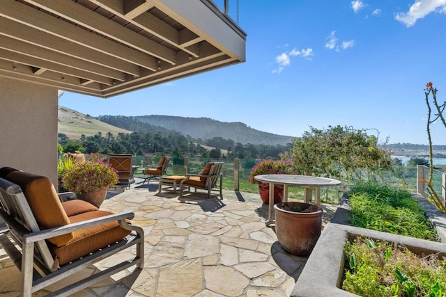 view of patio featuring a mountain view