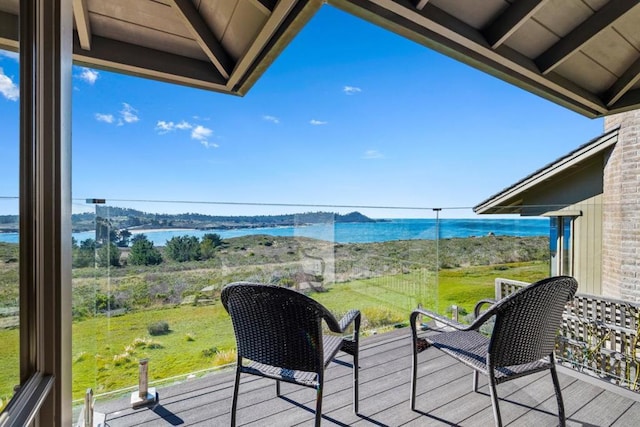 deck featuring a water view