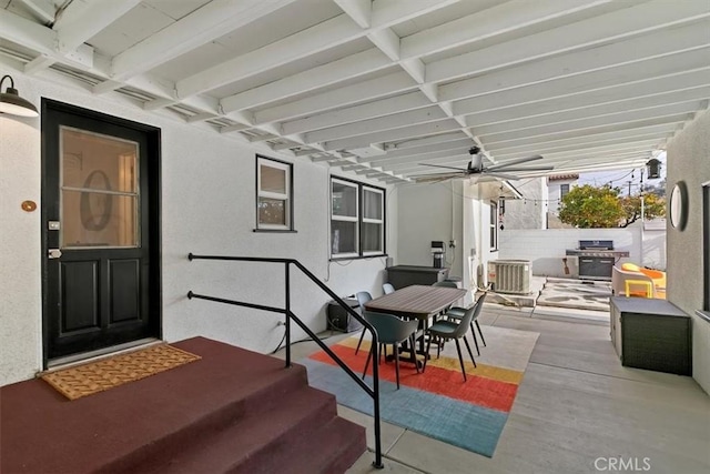 view of patio with a grill, cooling unit, and ceiling fan